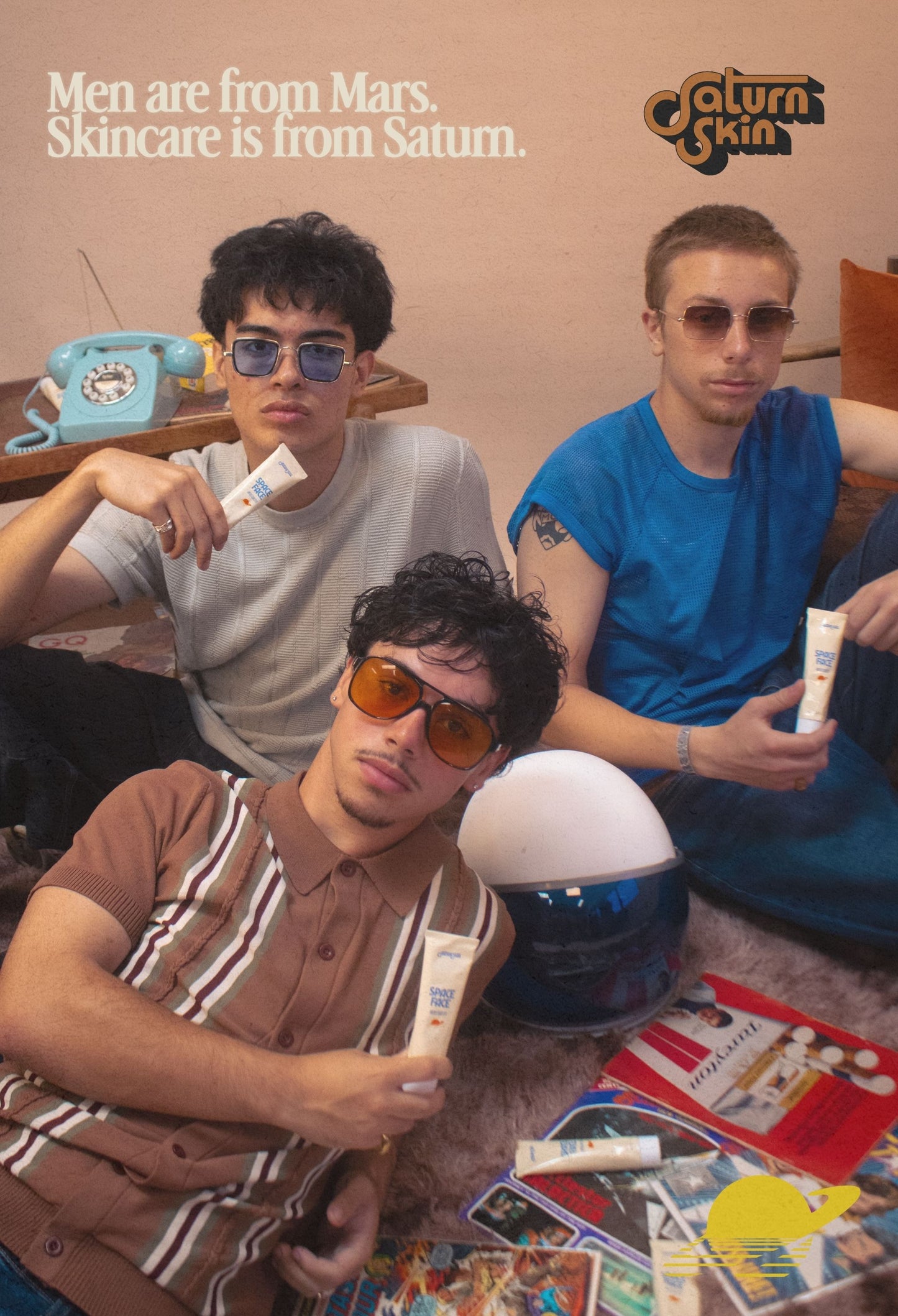 Three men sitting on a brown rug with Space Face Moisturizer. Retro vibes. Saturn Skin branding. Text reads "Men are from Mars. Skincare is from Saturn."